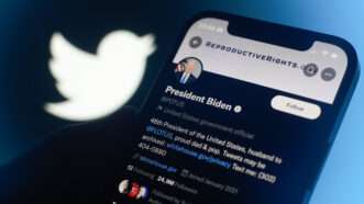 Twitter logo and a screen showing President Joe Biden's account